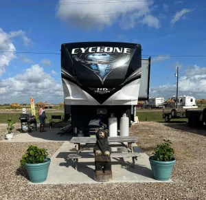 5th wheel RV parked on site